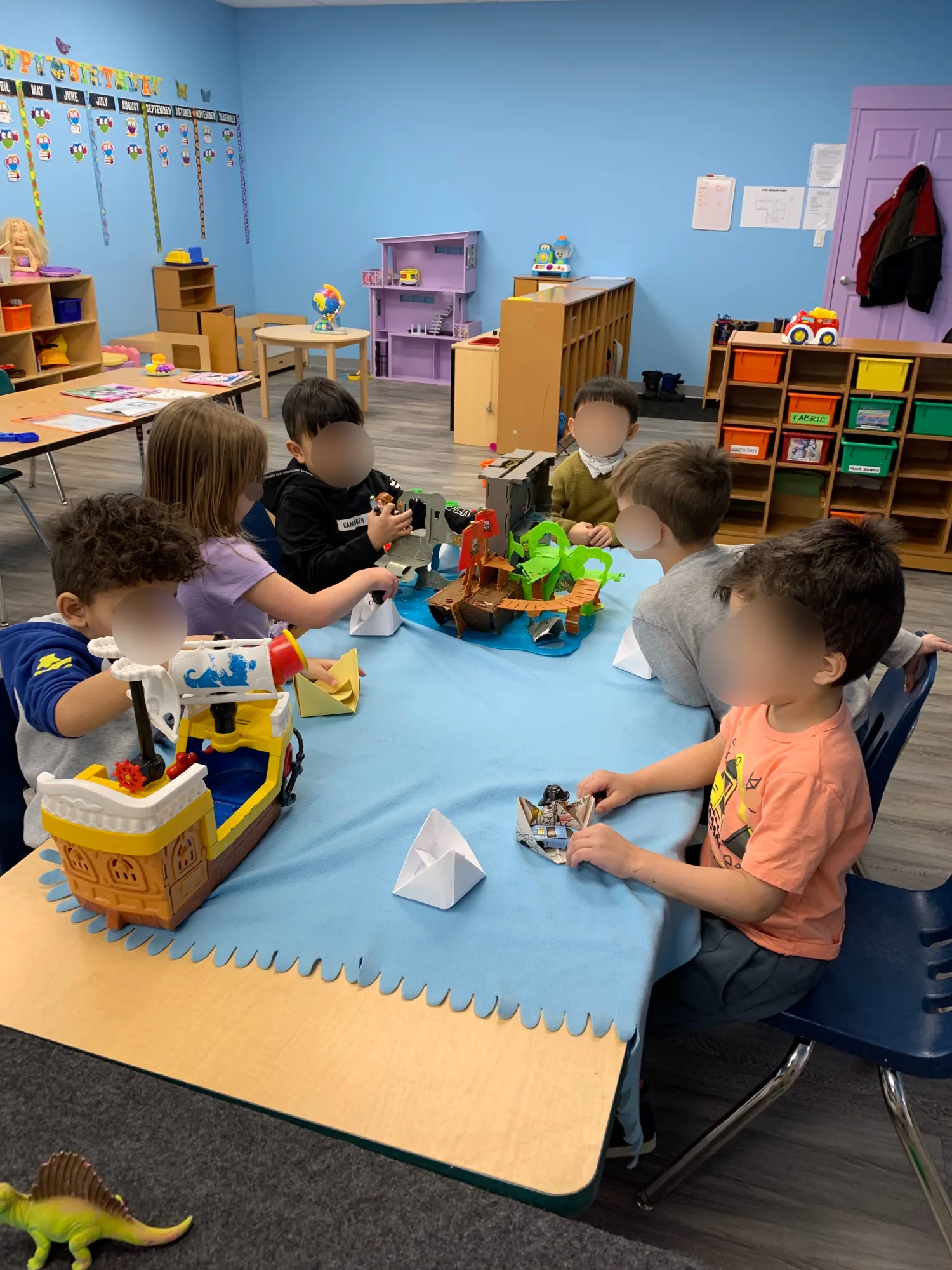 Village Scholars Preschool photo: tabletop play with friends