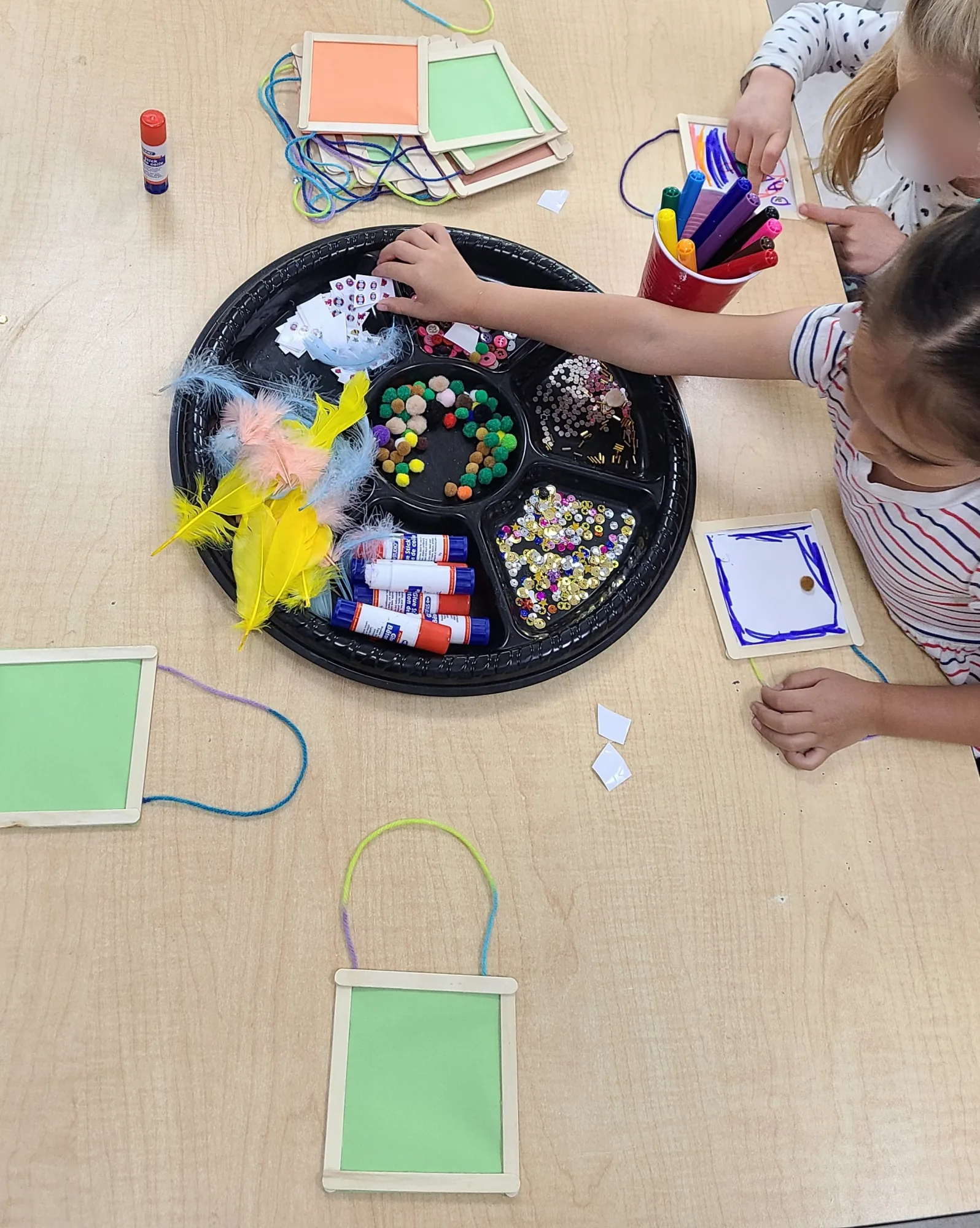 Village Scholars Preschool photo: loose-parts sorting and imaginative setup