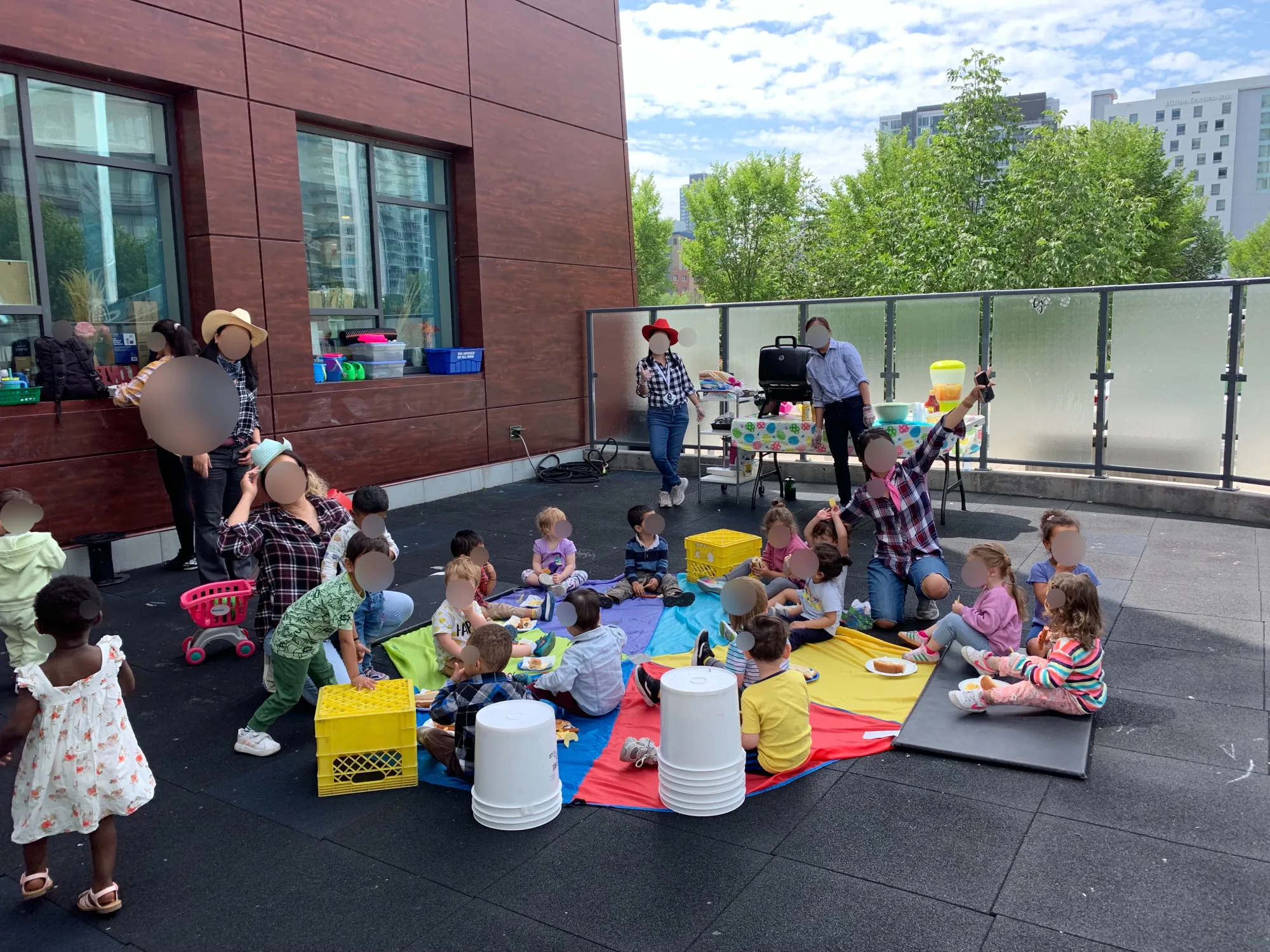 Village Scholars Preschool photo: family-style gathering on the patio