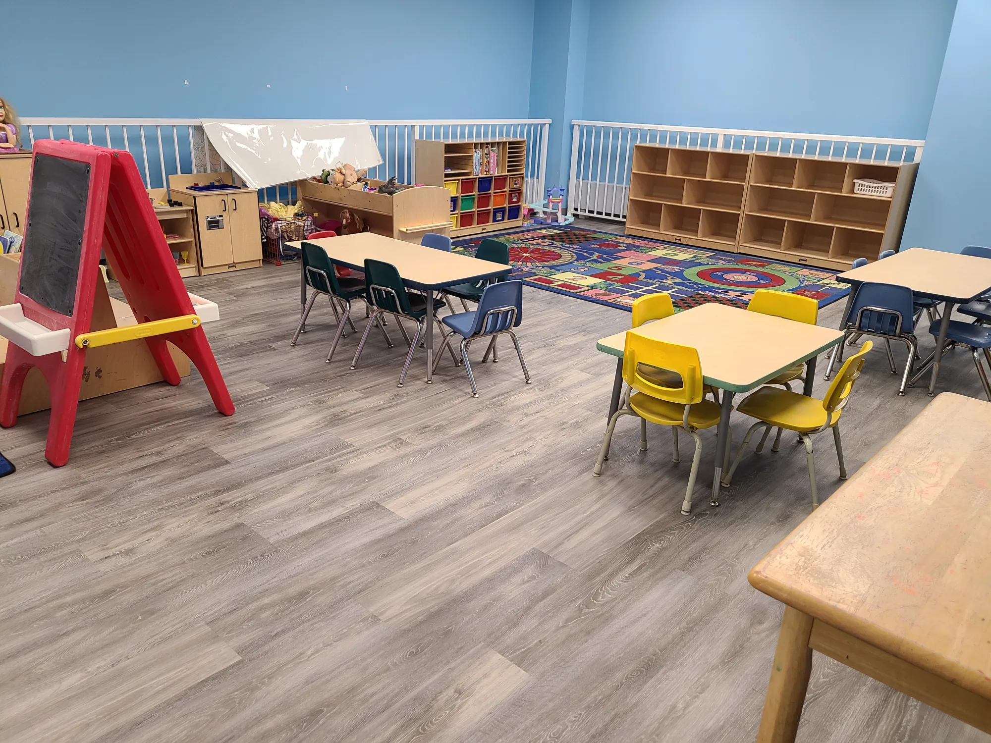 Village Scholars Preschool photo: wide classroom layout with room to move