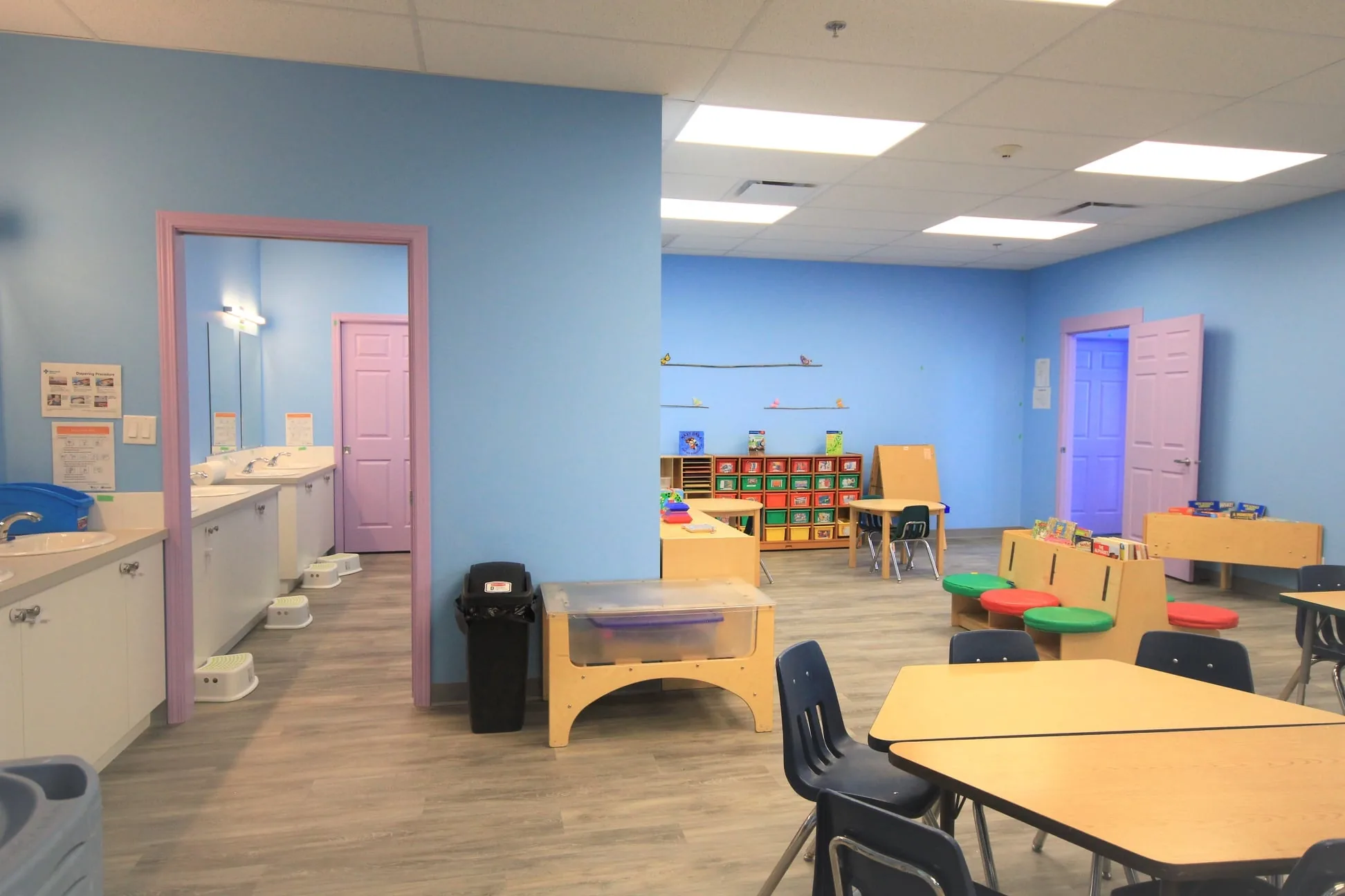 Village Scholars Preschool photo: bright classroom with sinks and shelves