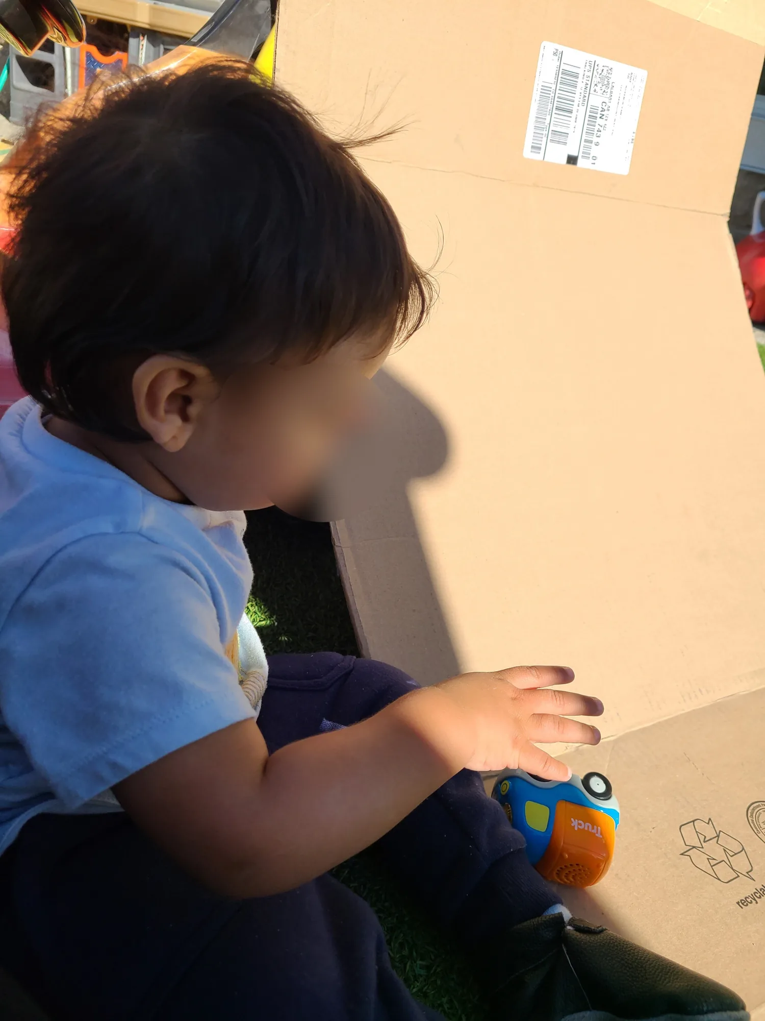 Village Scholars Preschool photo: quiet focus in the outdoor play area